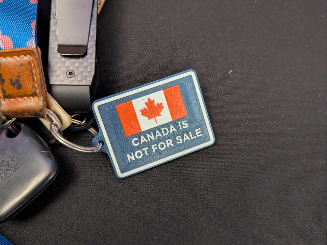 Canada is not for sale keychain (all caps text)