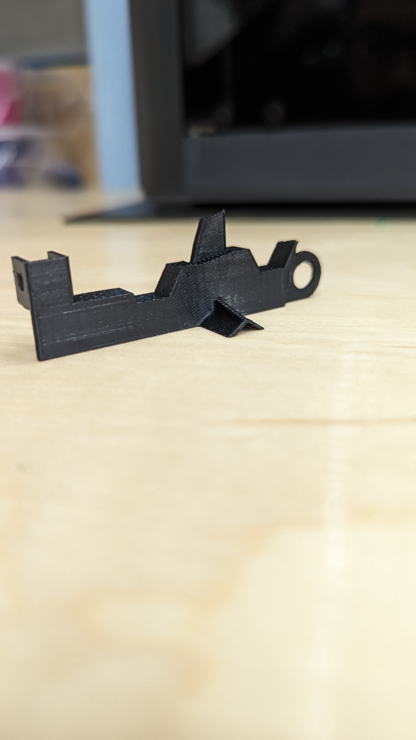 Roomba brush latch