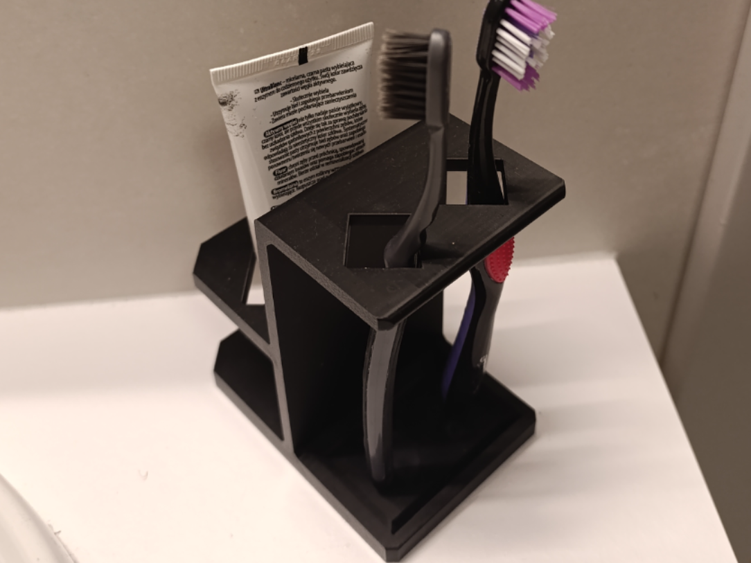 Toothbrush stand with place for toothpaste