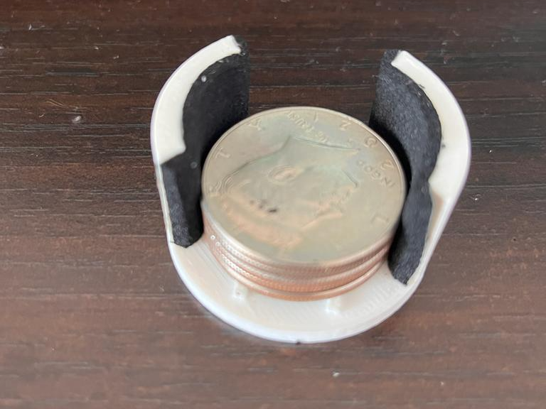 Truco de magia Coin dumper