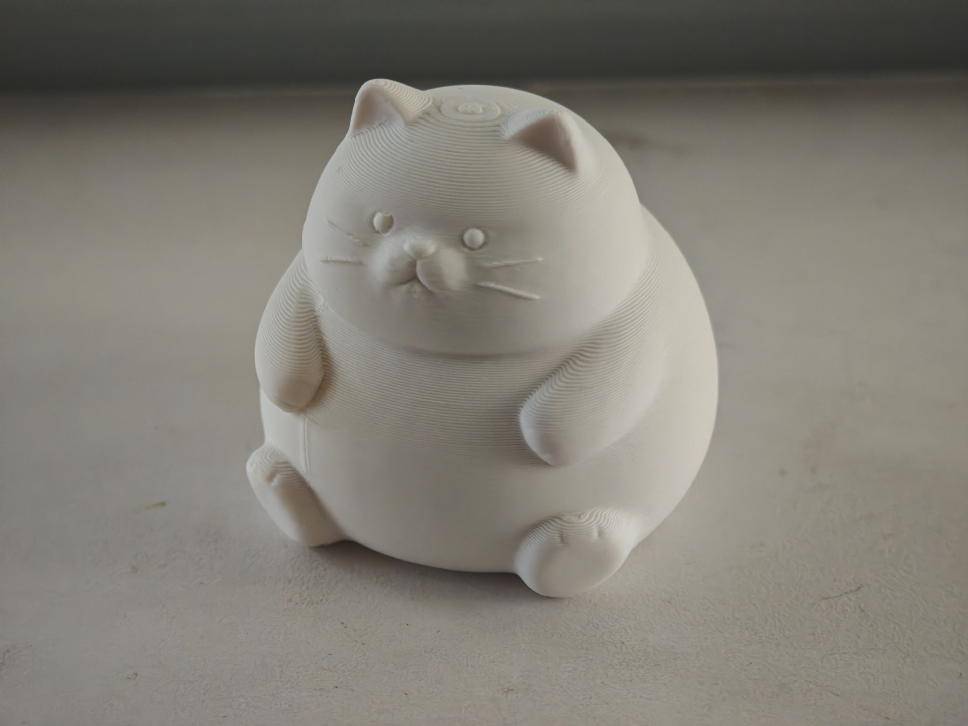 胖乎乎的橘色猫咪桌面摆件