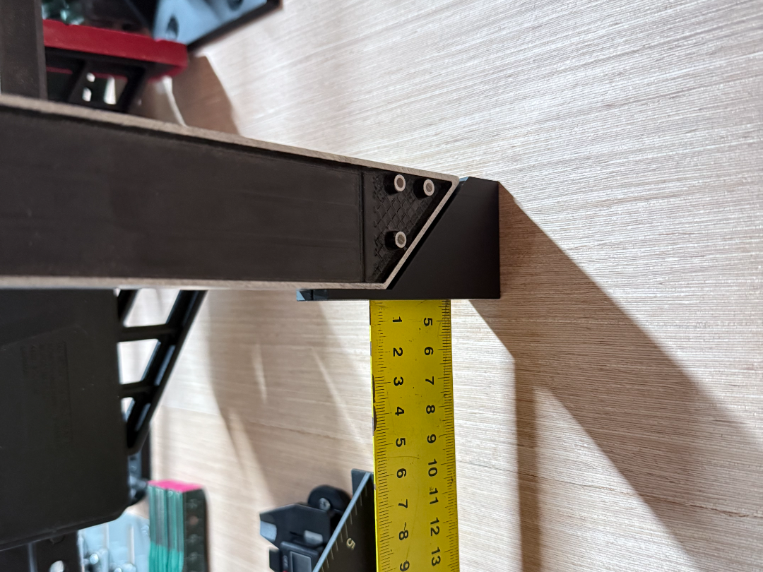 Try square ruler hook / wall mount