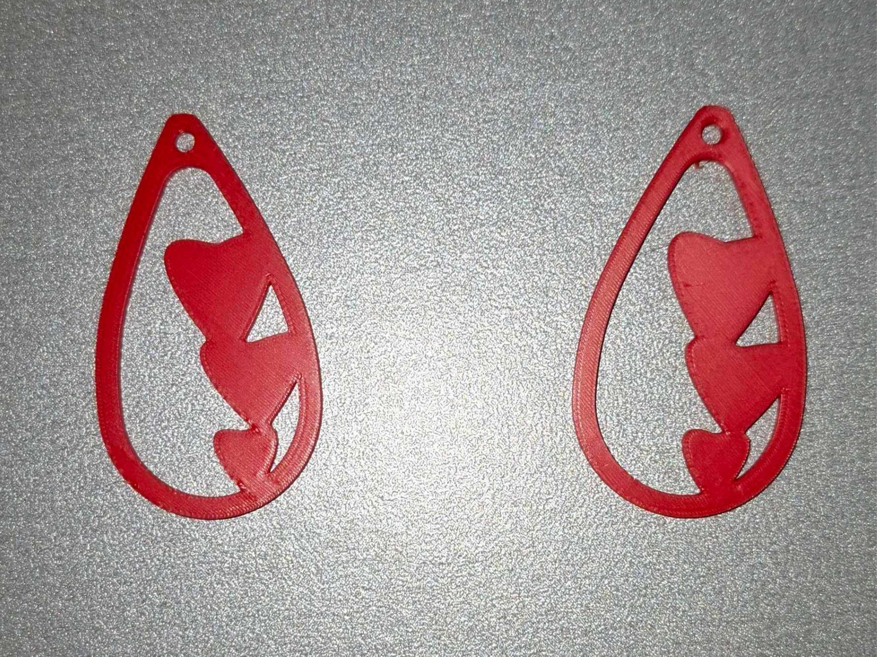 Boucle d'oreille coeur triple