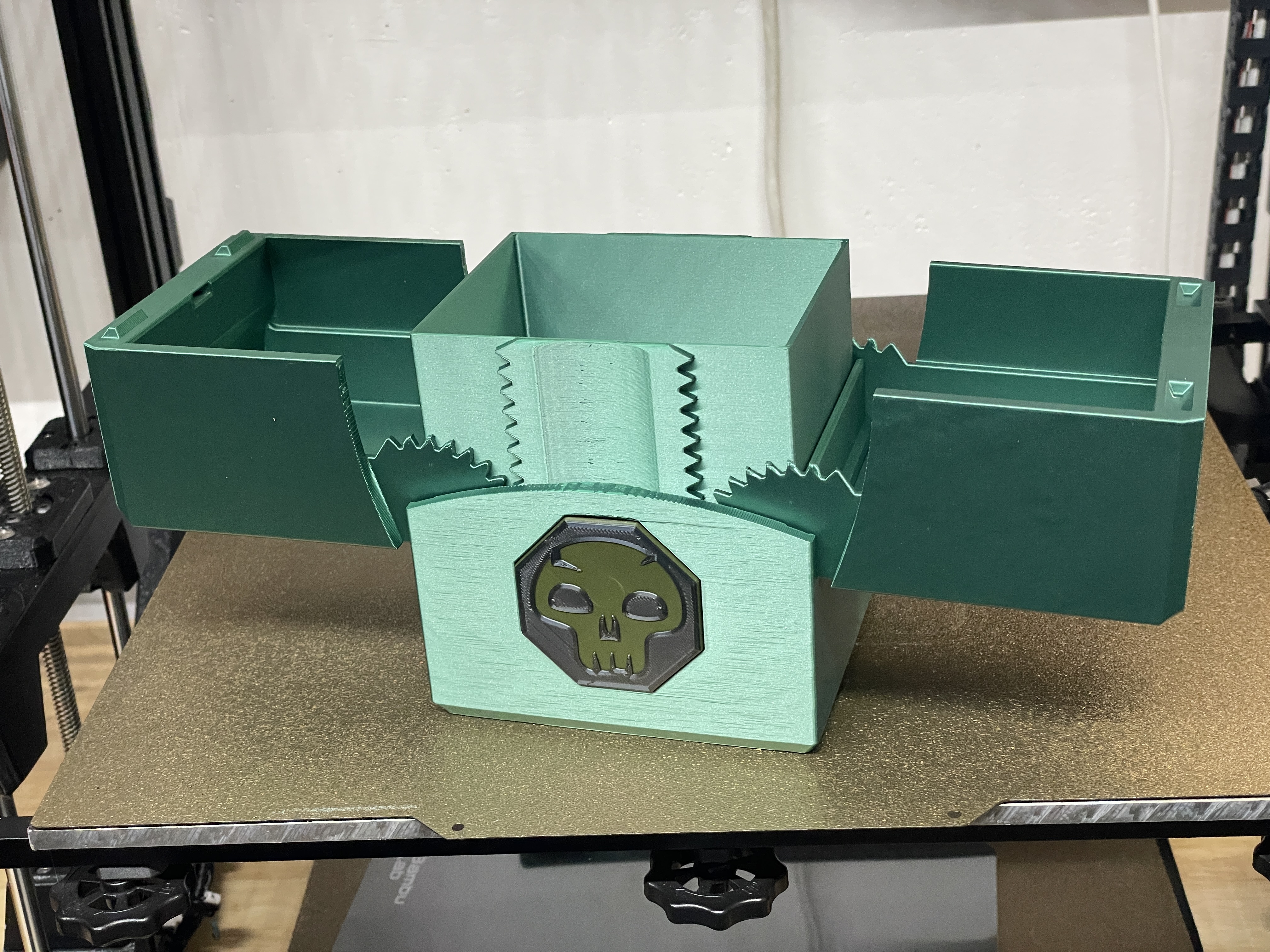 An oversized geared deck box for Planechase decks.