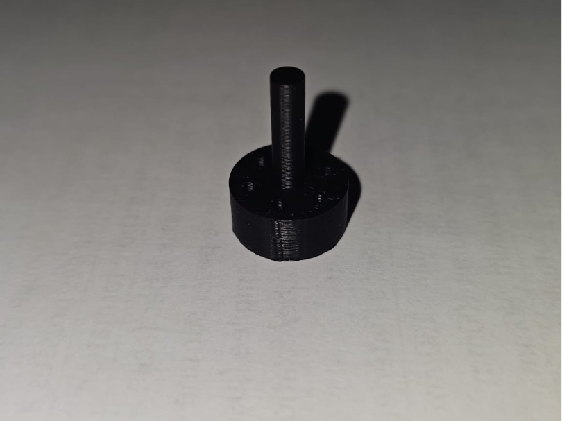 Shower head flow reducer