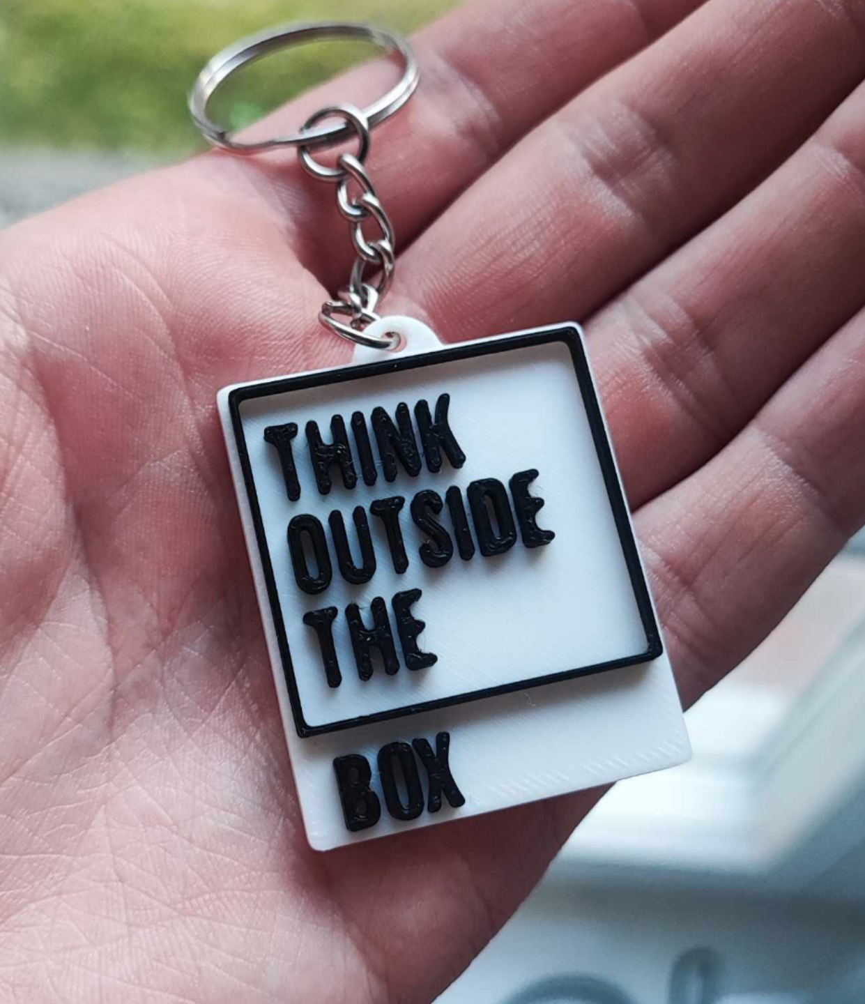 Think outside the box keychain
