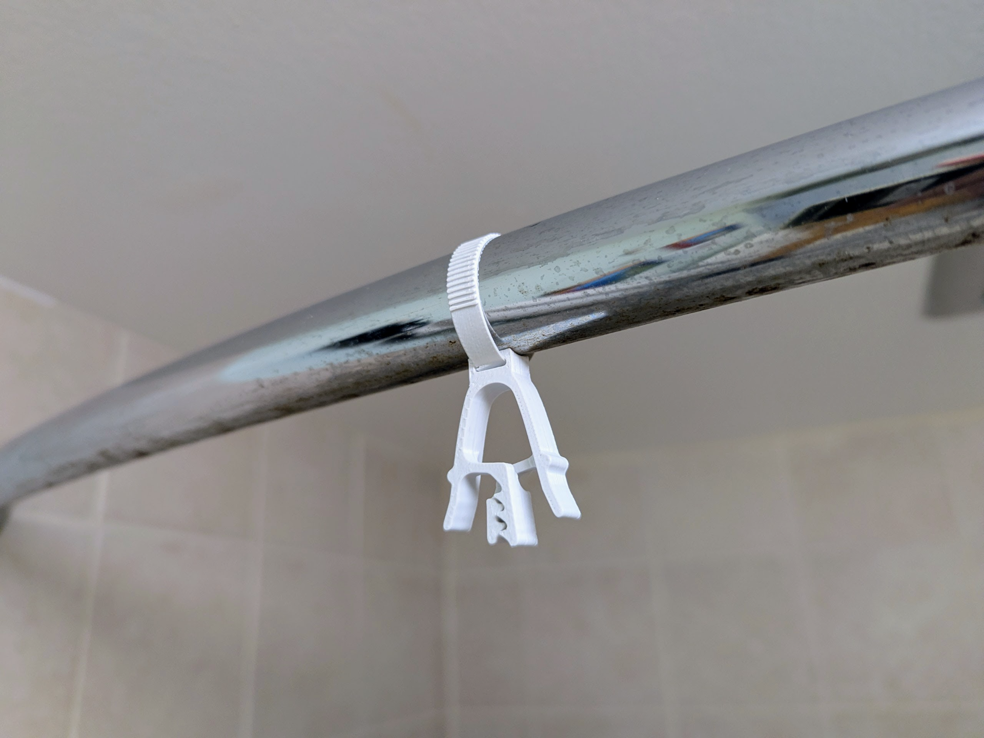 Bar Strap with Clip for hanging towels, etc.