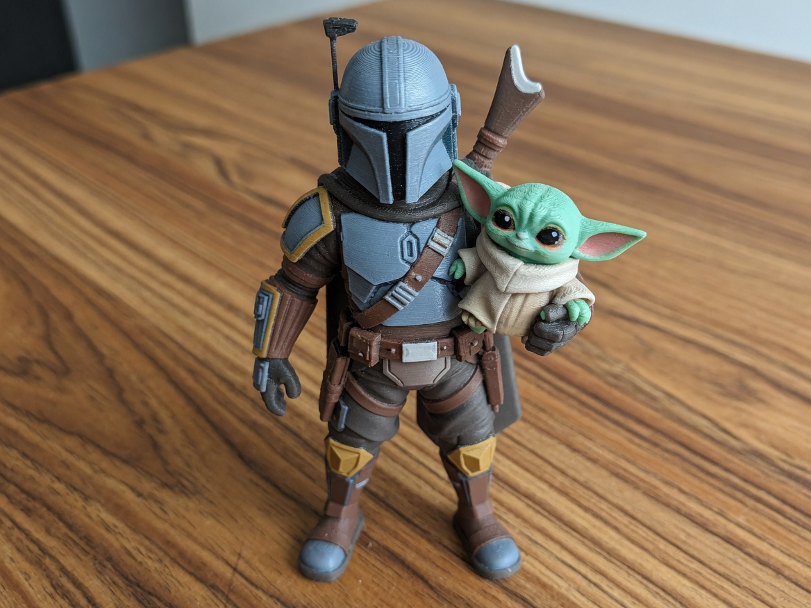 Mandalorian Carrying Grogu Figure | Star Wars
