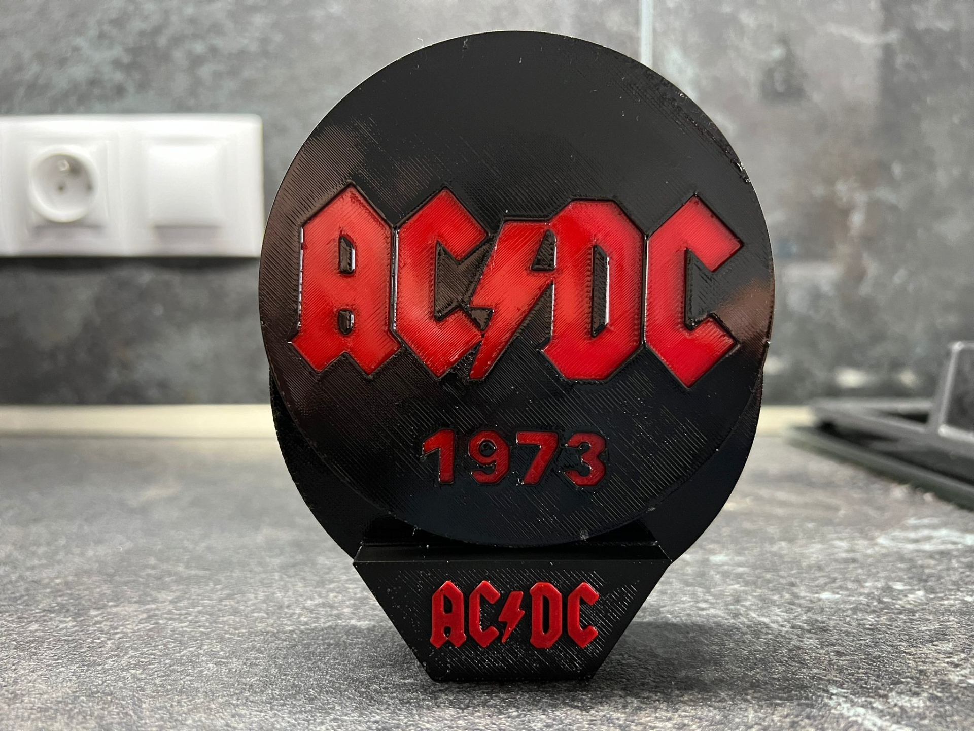 Tácek AC/DC
