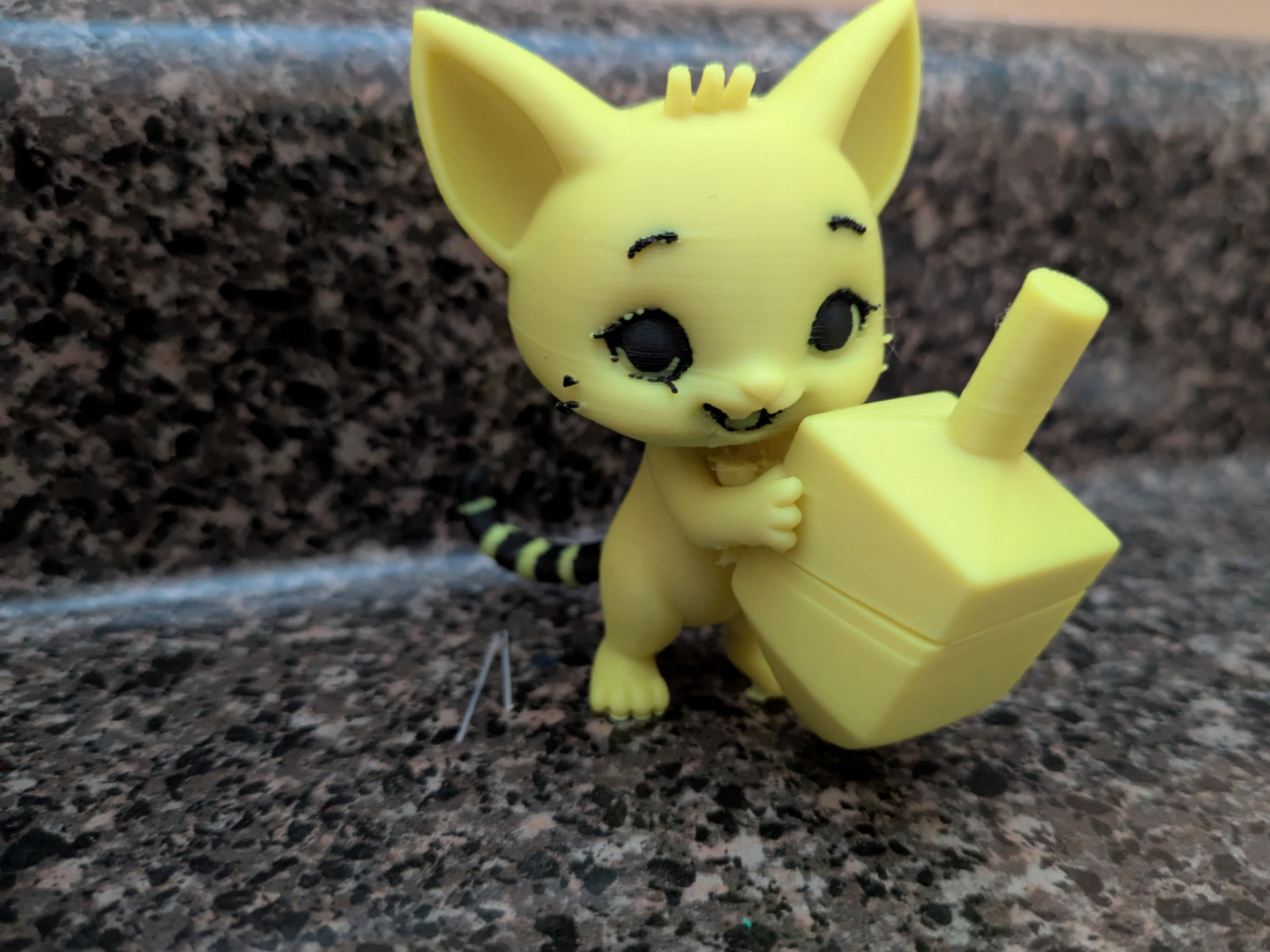 Kitten with dreidel