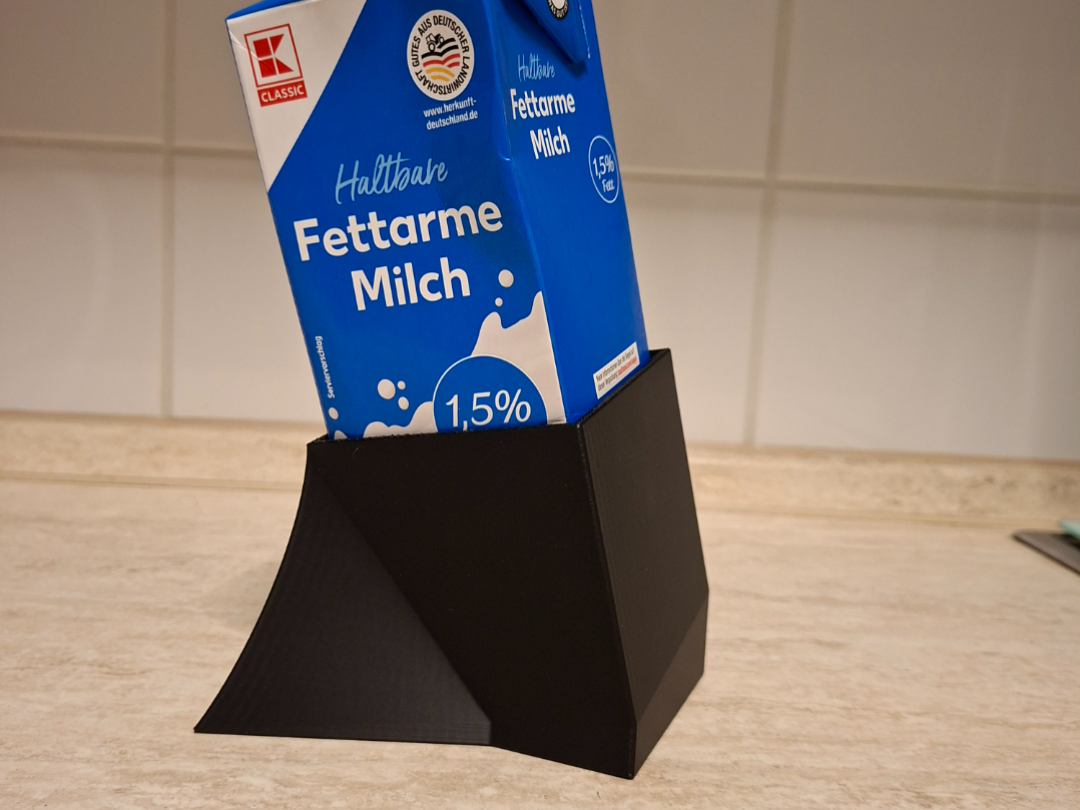 Milchhalter kippend