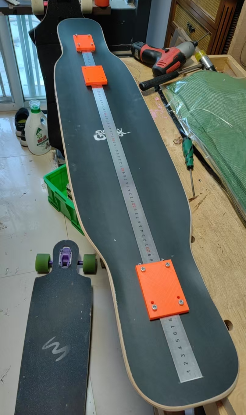 Longboard redrilling jig