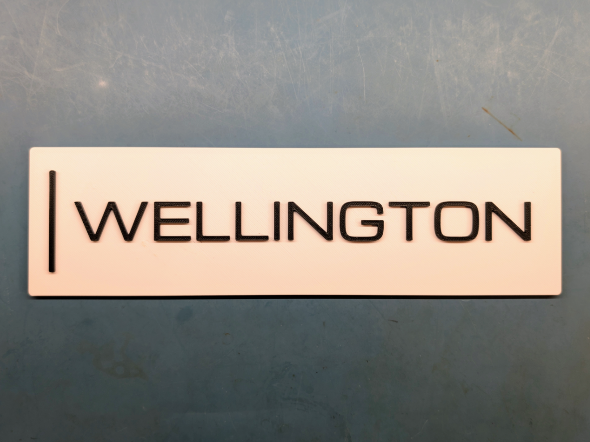 Wellington Room Sign