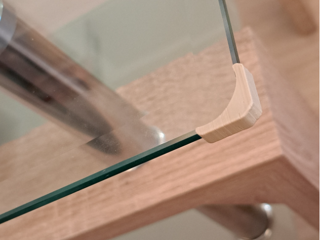 Glass table corner