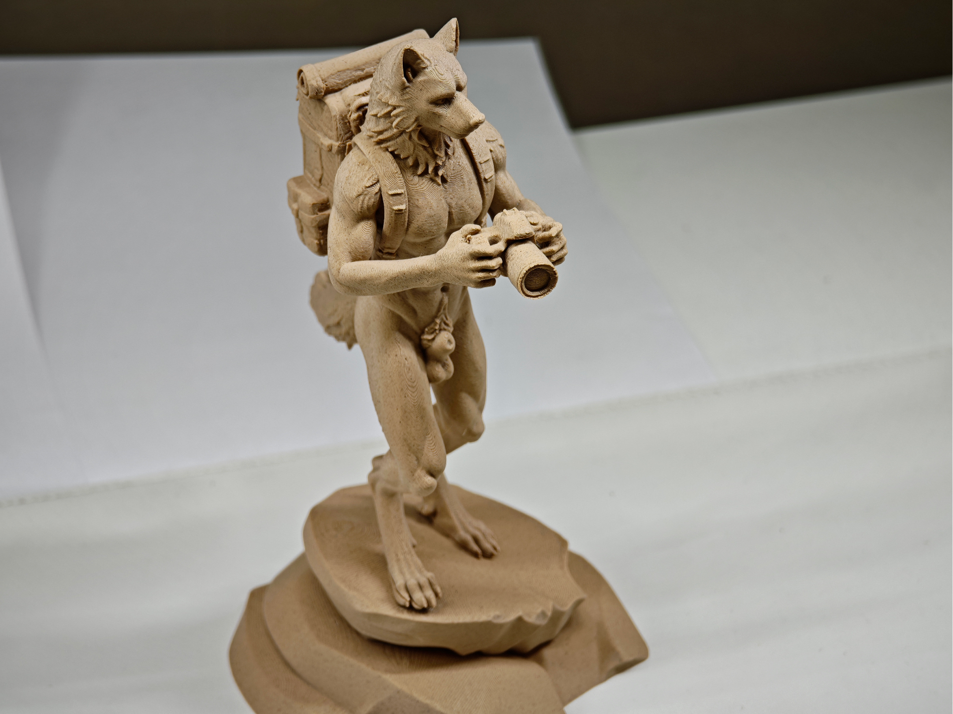 Wolf Mountaineer sculpture (tasteful nudity)