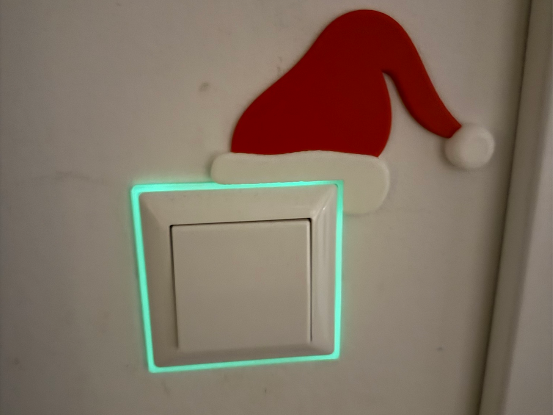 Weihnachtliche Lichtschalter - Weihnachtsmütze