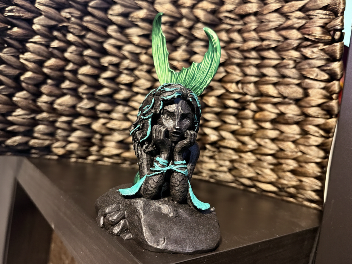 Mermaid on a Rock Sculpture
