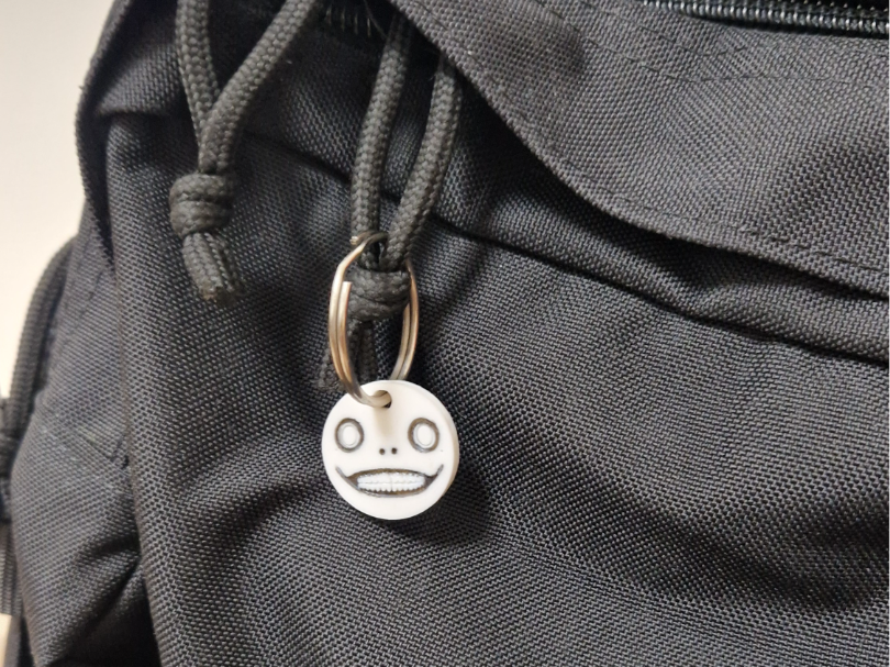 NieR Emil face keychain