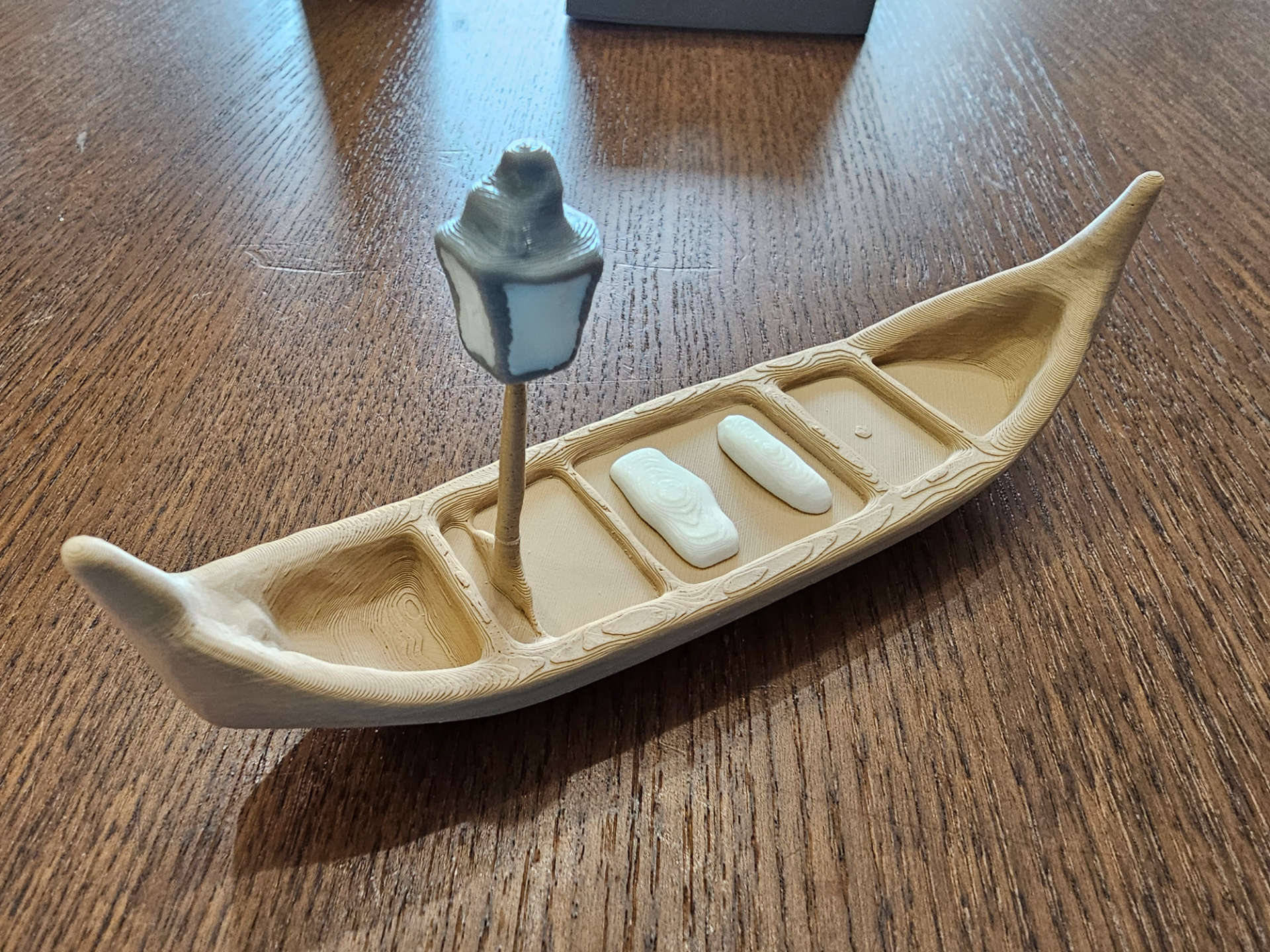Wooden Canoe with Lantern & Pillows