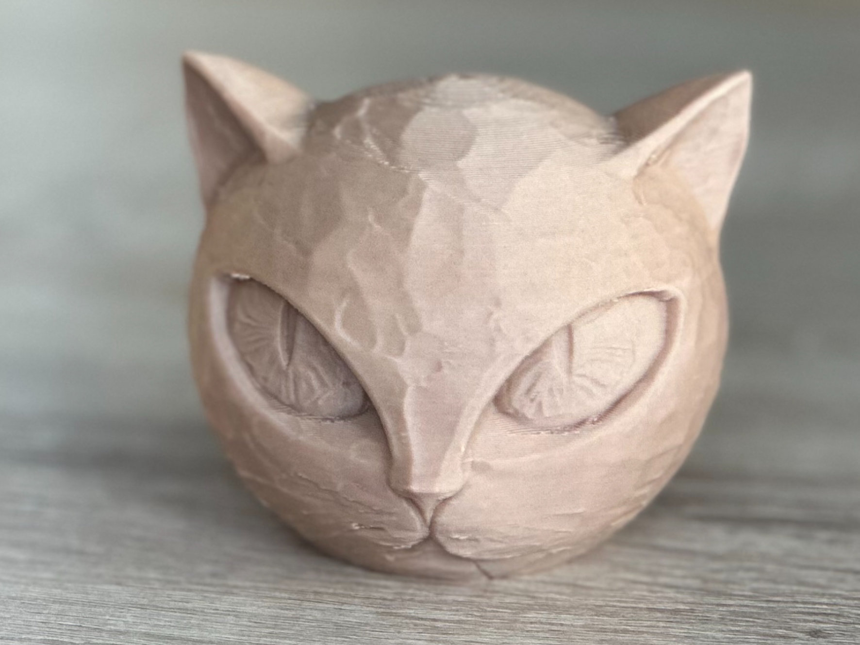 Carved cat head
