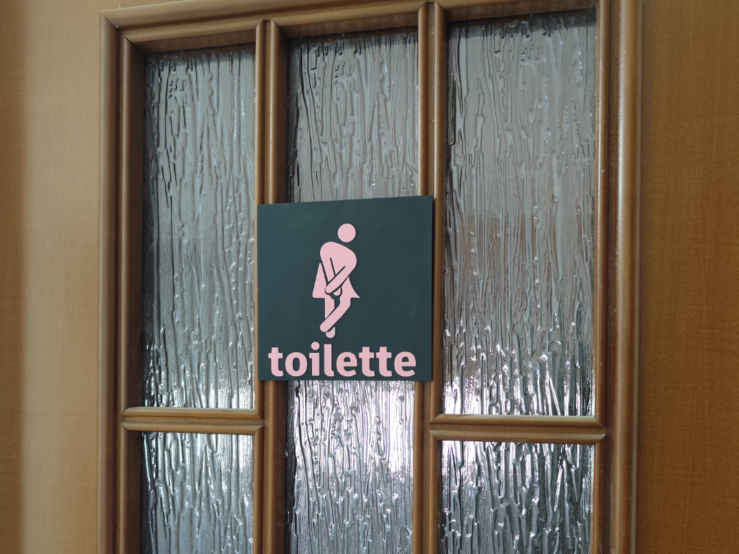 Women's bathroom sign