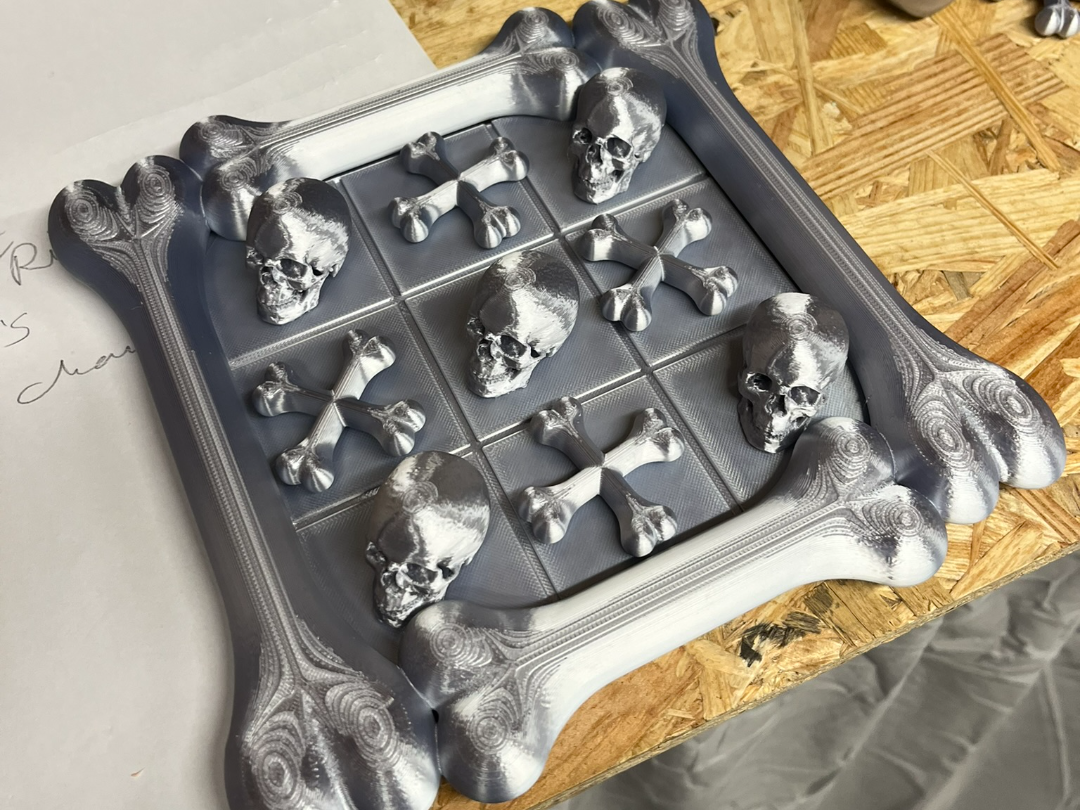 noughts and crosses bones and skulls
