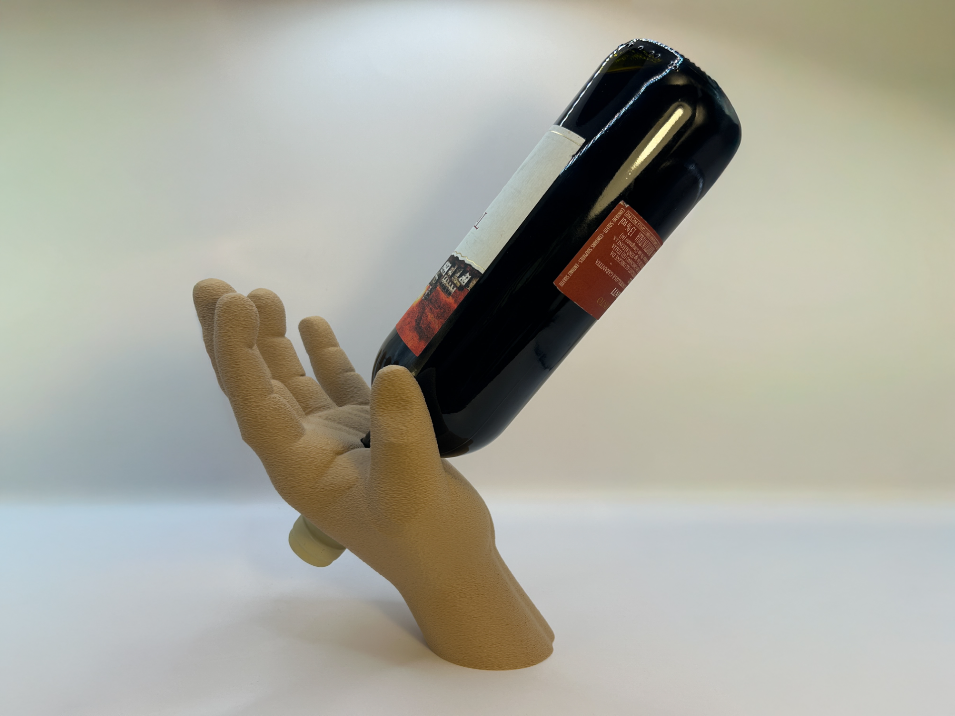 Wine bottle gravity holder