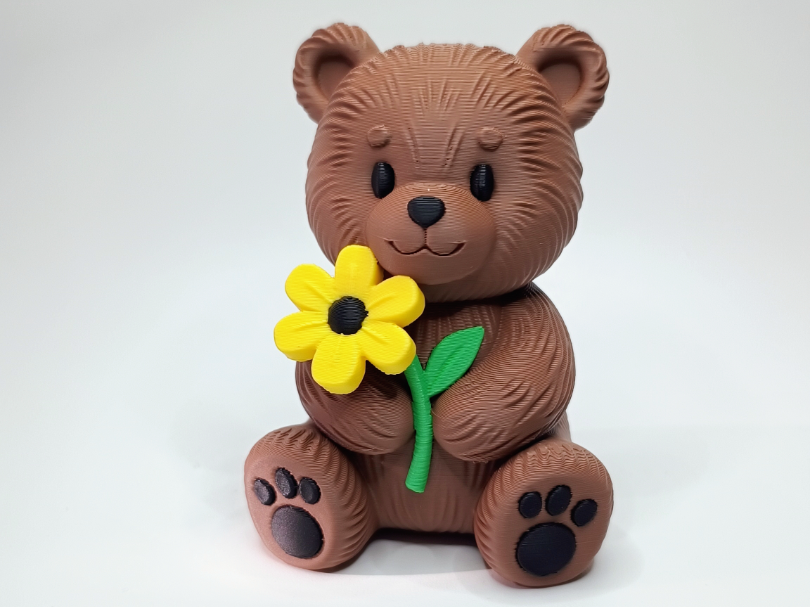 Suesser Blumenbaer fuer Fruehling und Muttertag