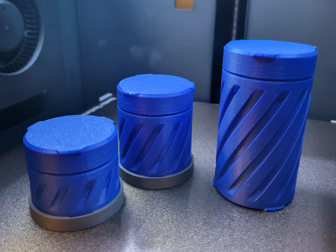 Stackable containers with twist lock connectors
