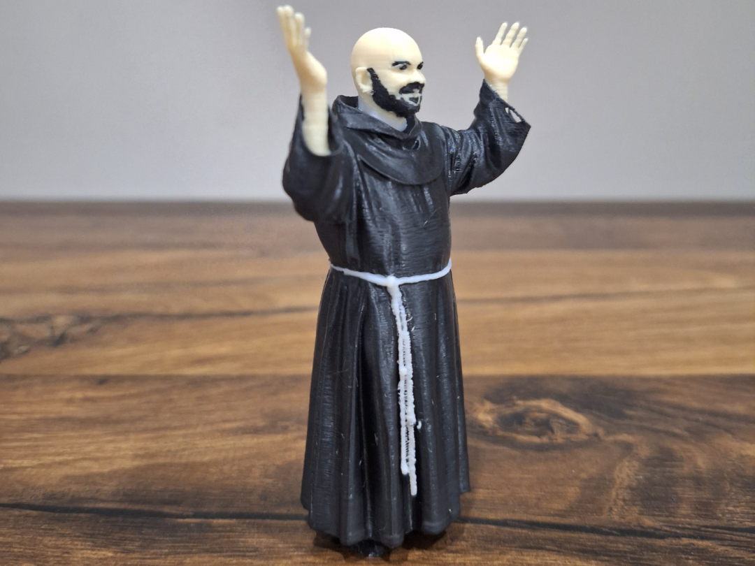 Figurine of a Priest