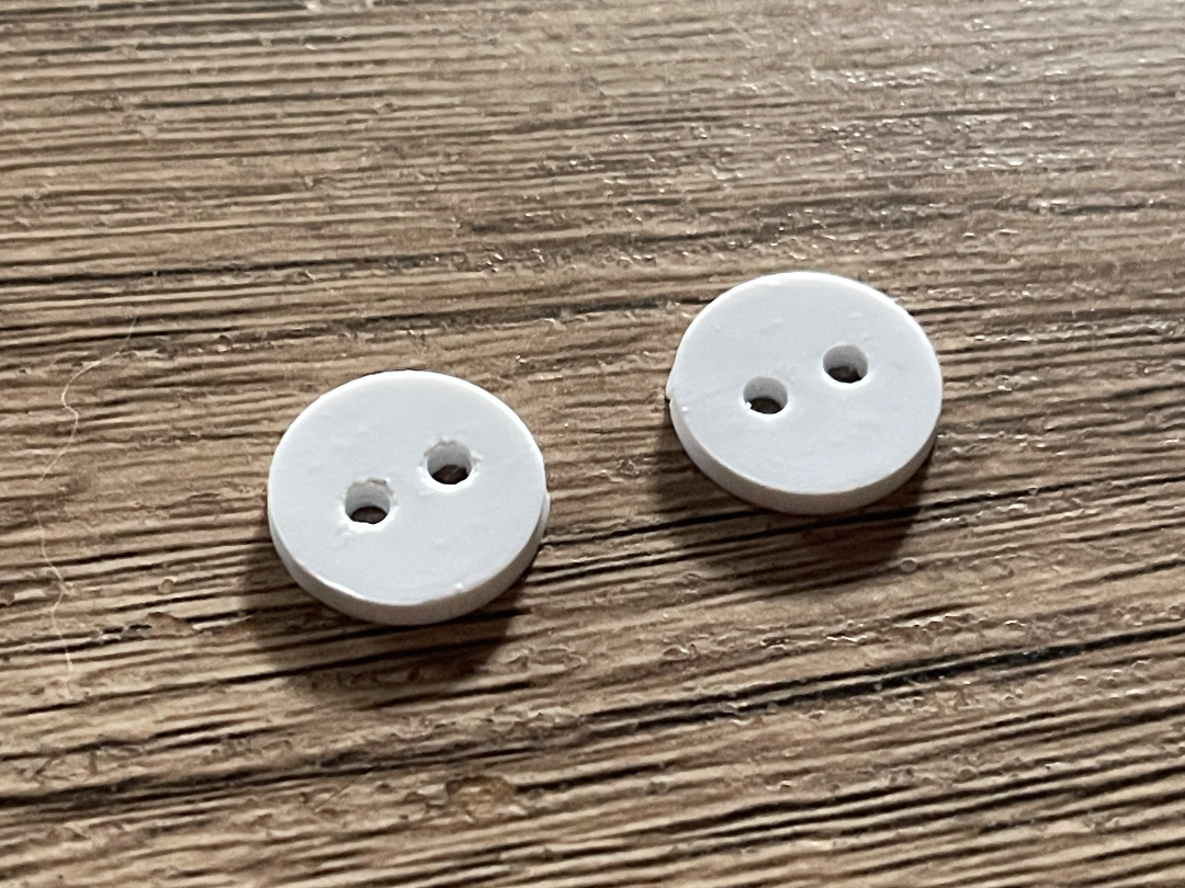 Two-hole sewing button