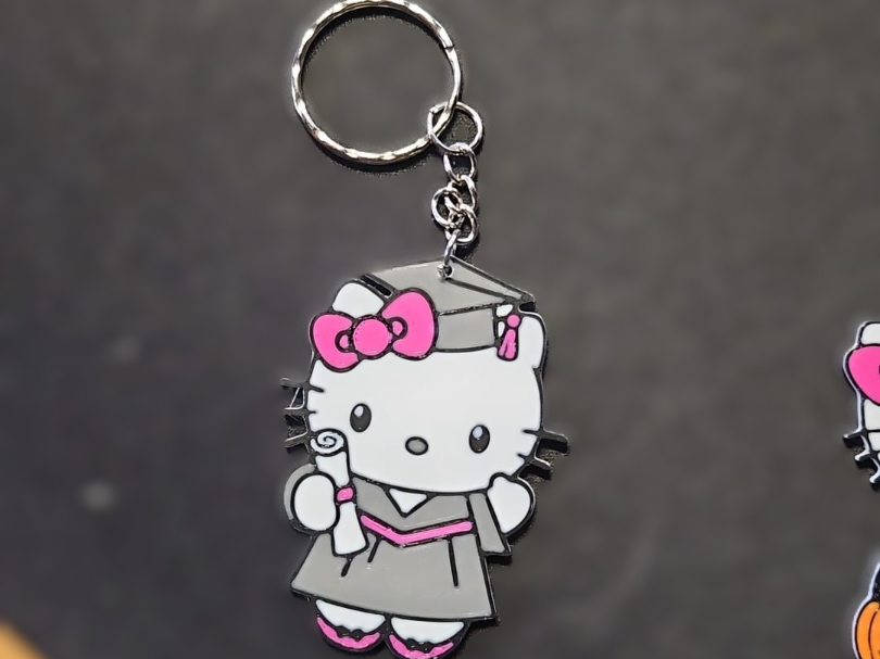 Hello Kitty Graduation keychain 2 faces