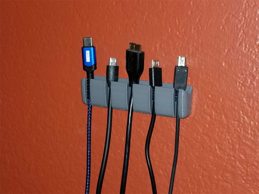 USB cable organizer screw mount or command strips