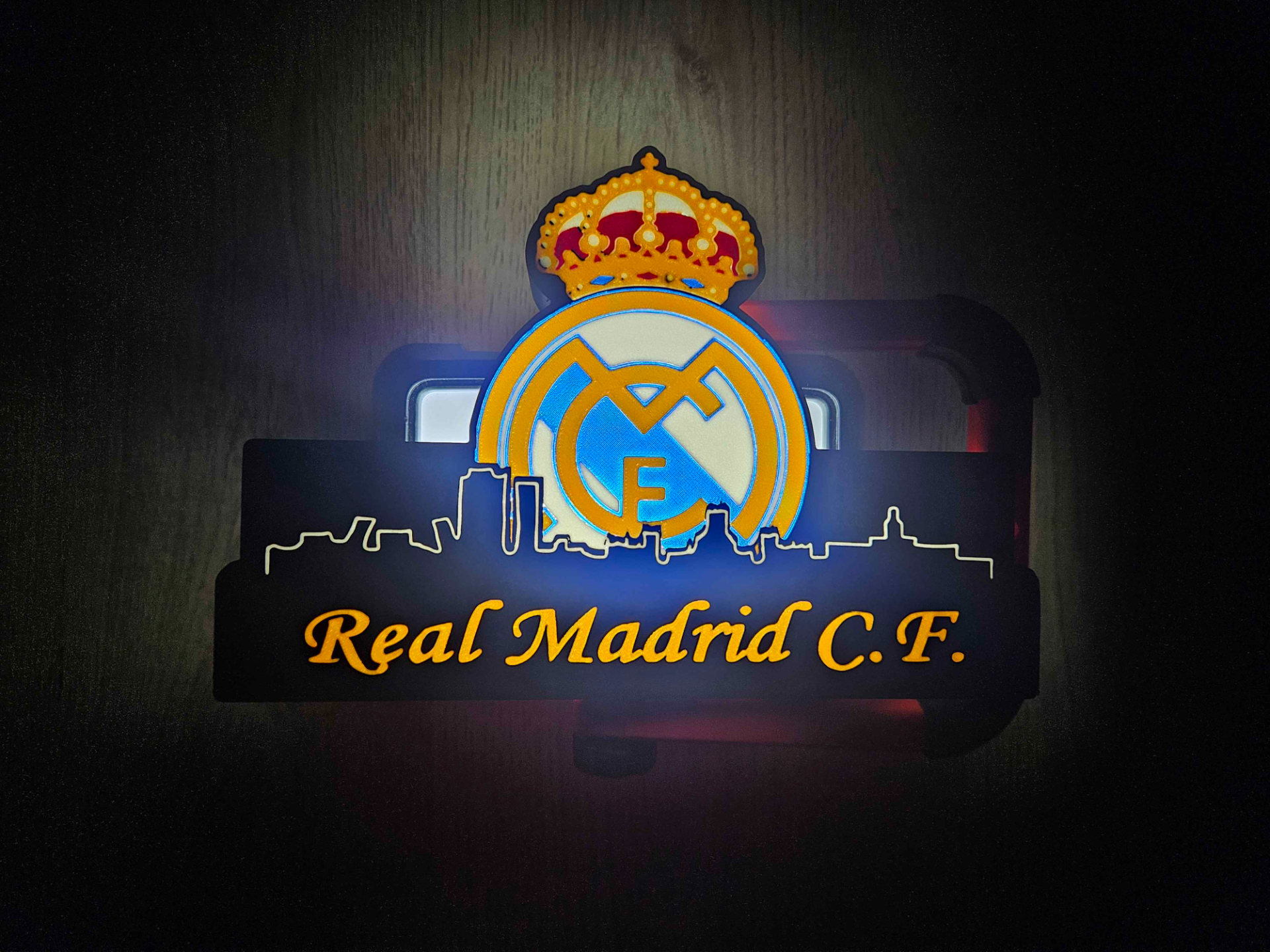 Real madrid CF lightbox with skyline of madrid