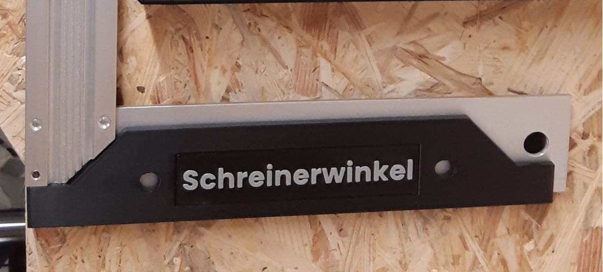 Schreiner Winkelhalter mit Beschriftungsschild