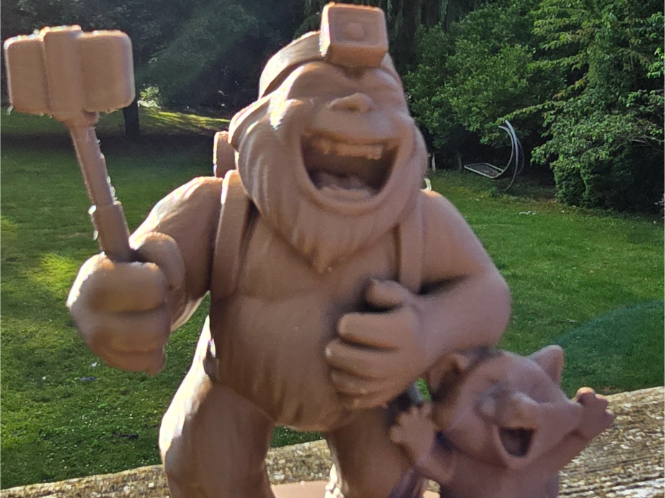 Sasquatch and Raccoon laughing taking a selfie