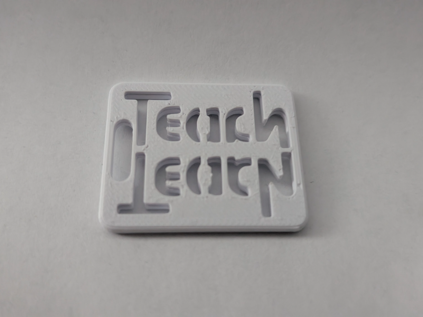 Learn Teach Ambigram optical Illusion