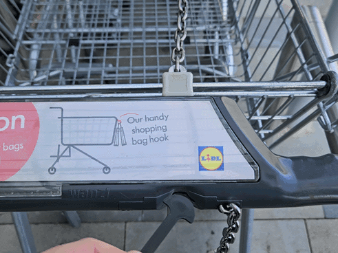 Shopping trolley unlocking key and token