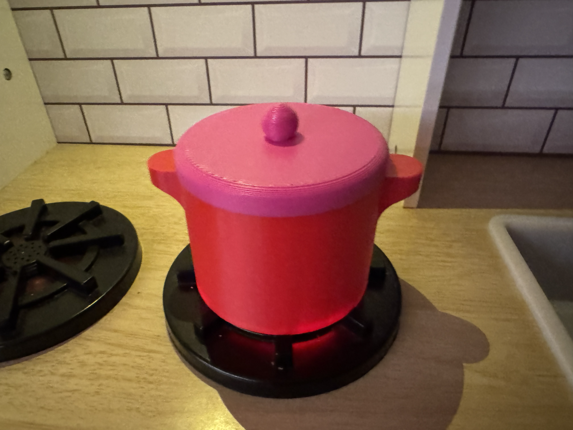 Pot with a lid for a children's kitchen