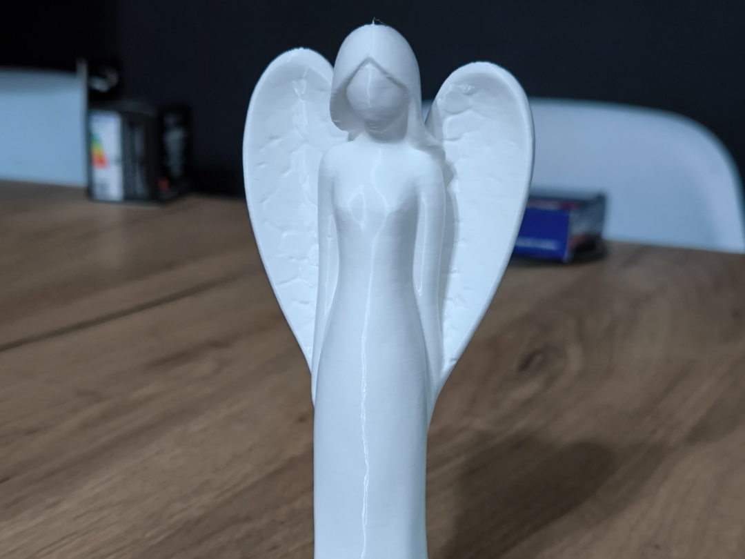 Angel Figurine – Graceful Decorative Sculpture