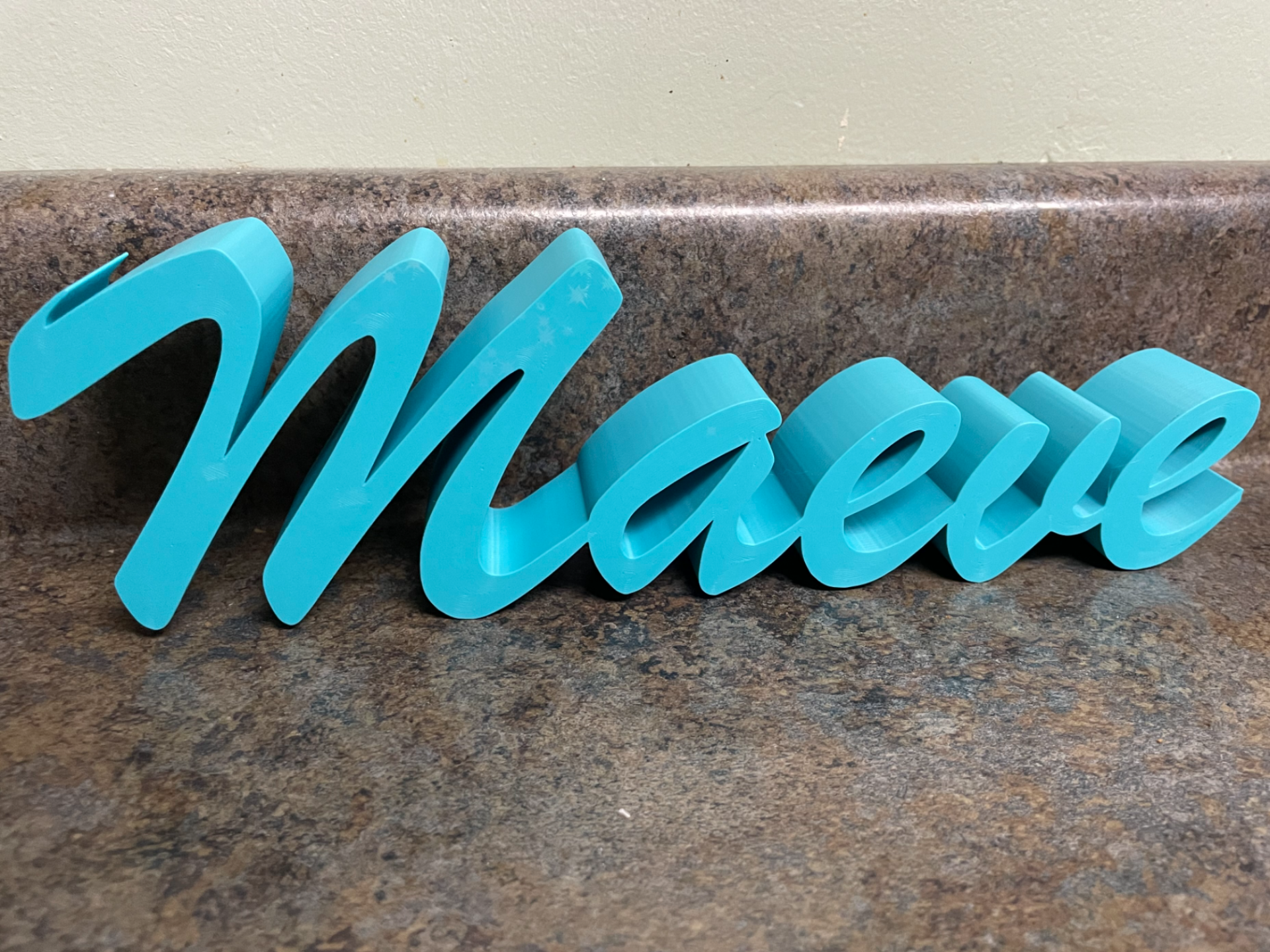 Maeve name in cursive