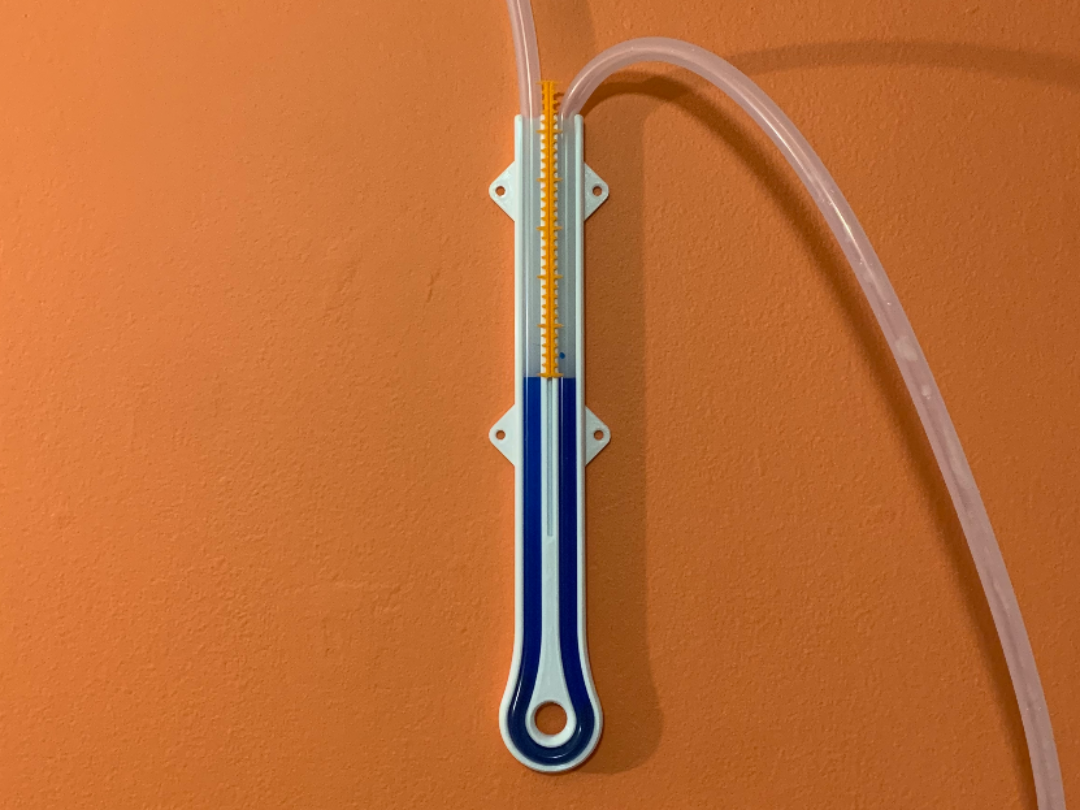 Water column manometer (measures low air pressure)