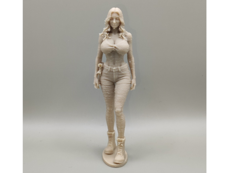 A girl in shorts with two big -  figurine