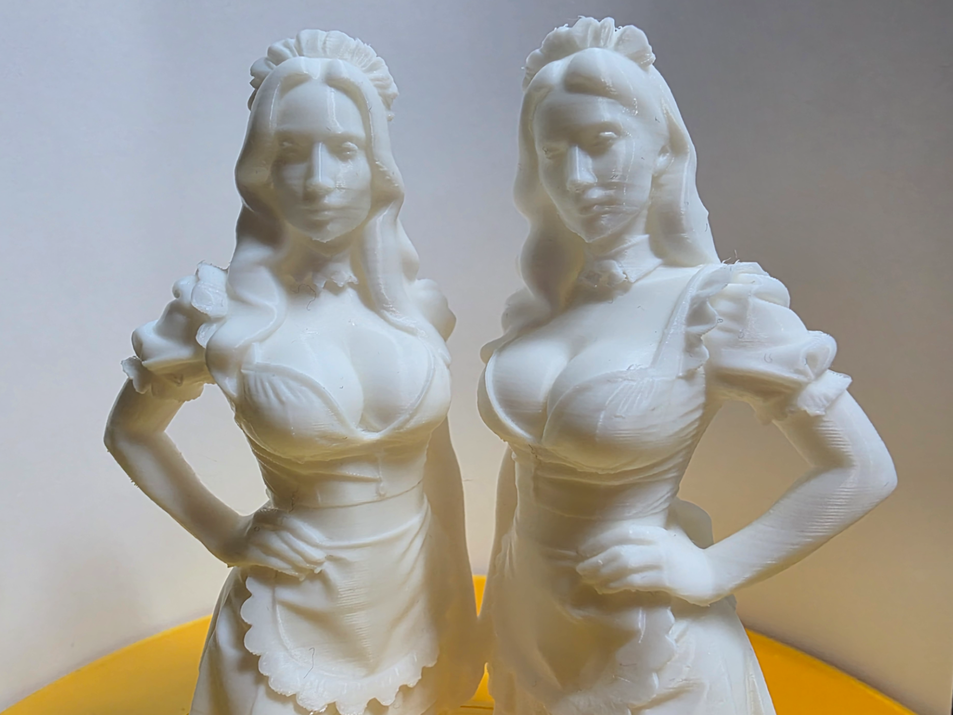 two maids in daring outfits