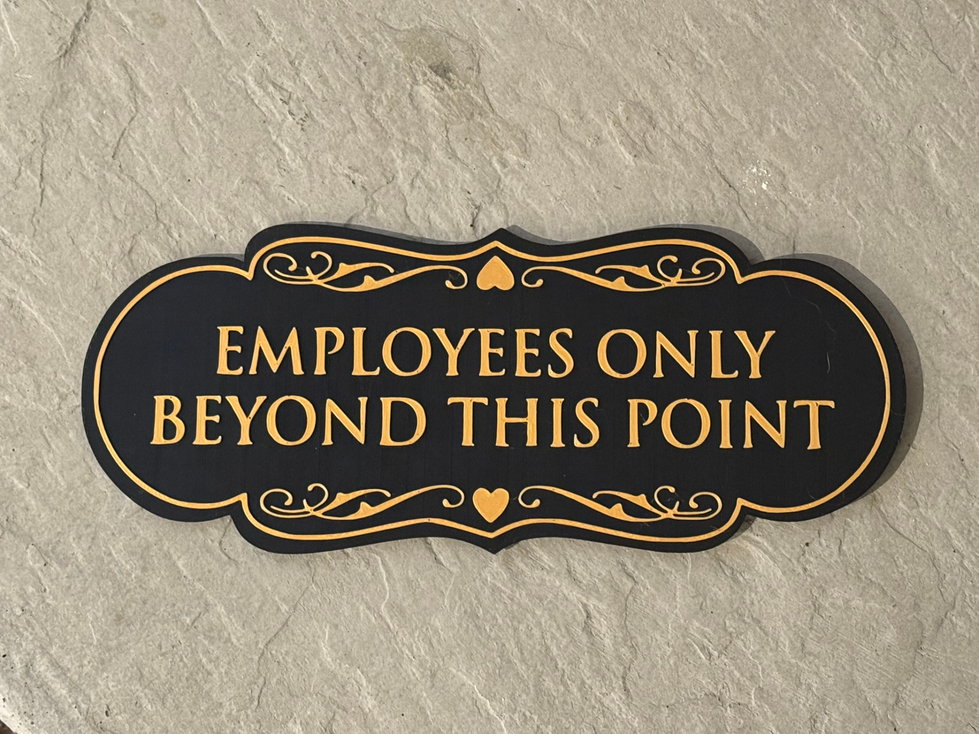 Employees Only Beyond This Point Sign