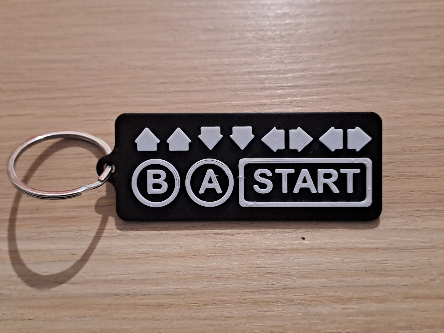 Porte-clés "Konami Code" personnalisable