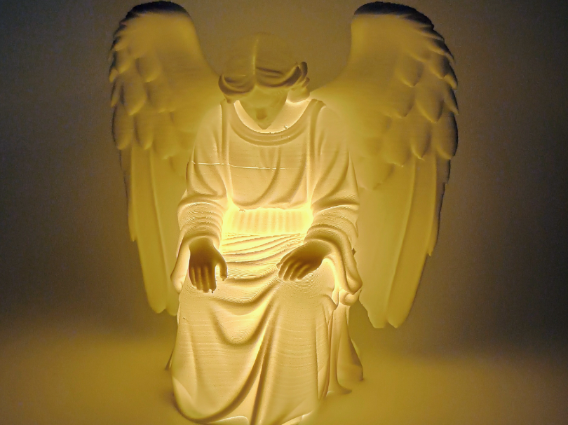 Sanfter Schutzengel mit Lichtschein Figur