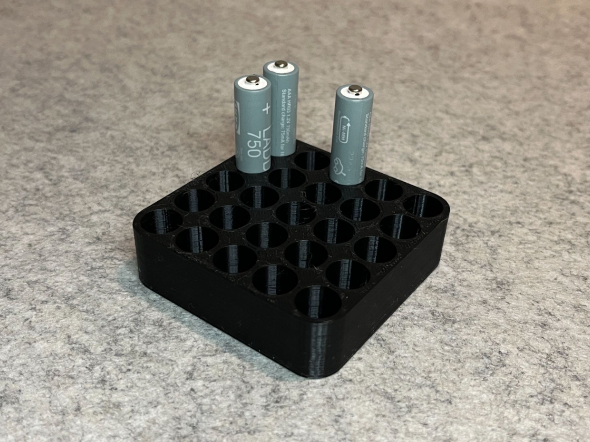 Battery holder for 25 AAA batteries