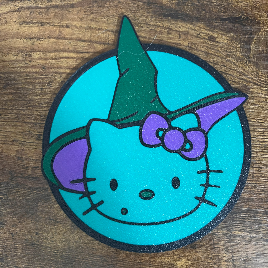 Hello Kitty cosplaying Wicked Witch Coaster