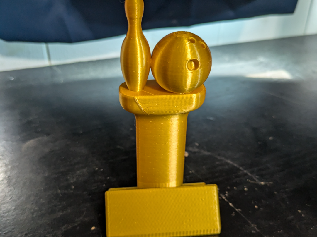 small bowling trophy with blank name plate